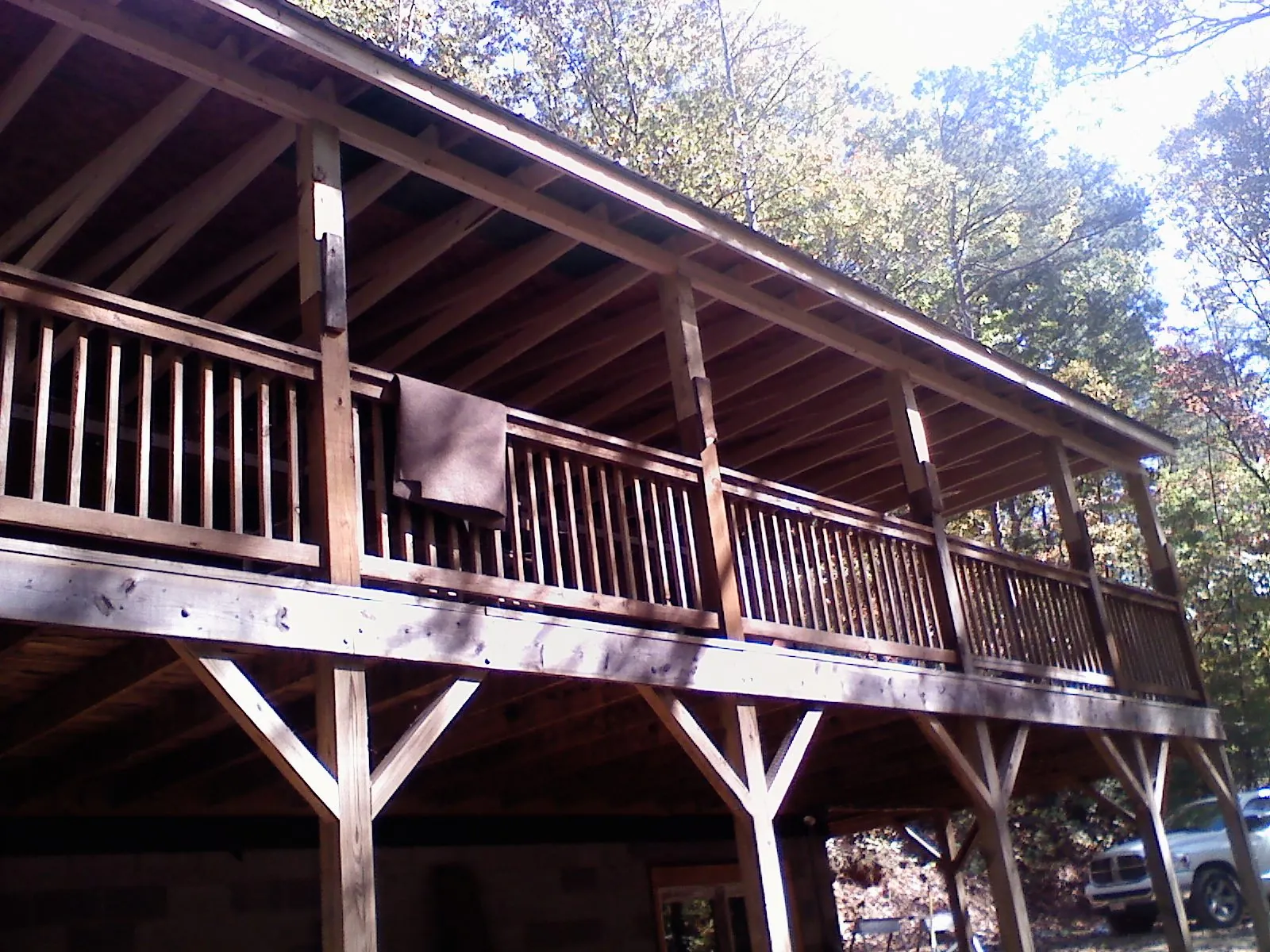 Timber framing under a new elevated porch and deck — Roof Leak Repair in Poland by Roofing Brothers